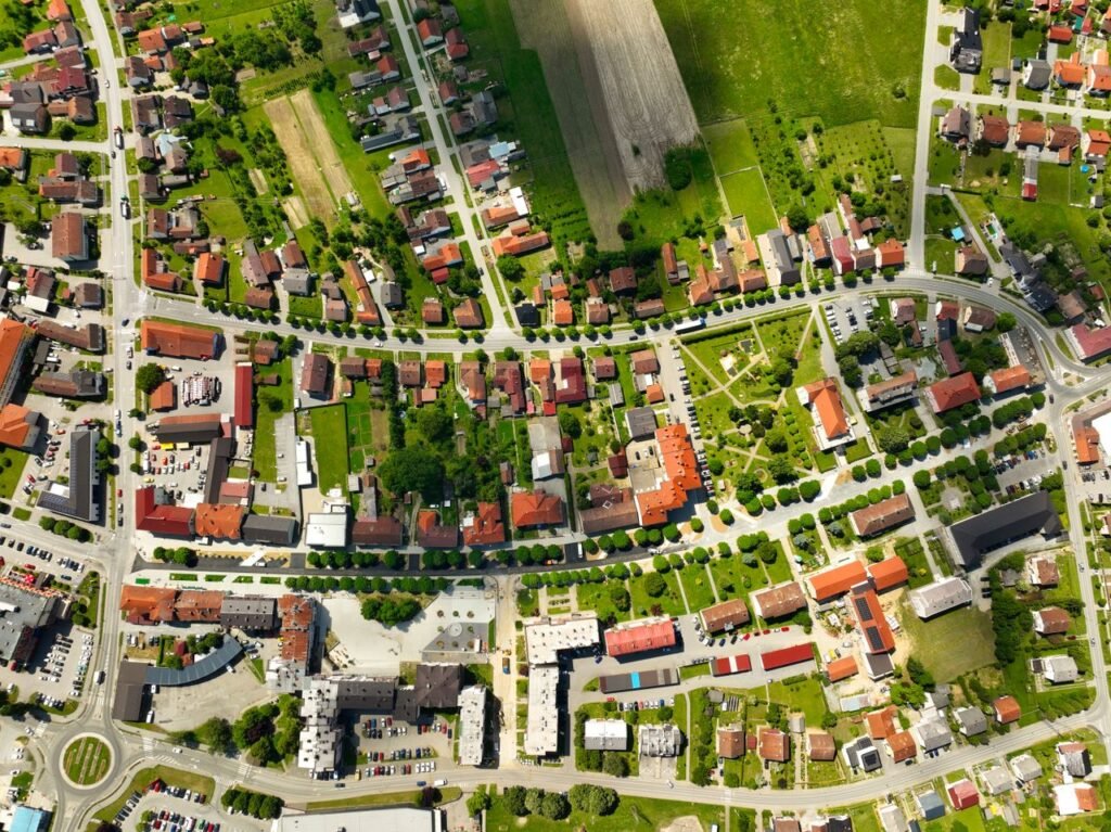 Aerial view showcasing the layout of Garešnica, Croatia with buildings and greenery.